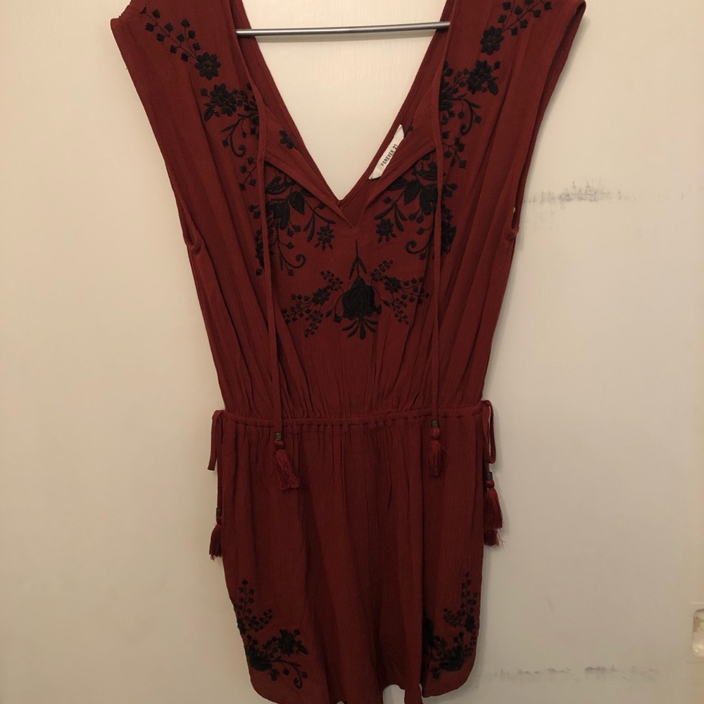 Burgundy romper with black detail